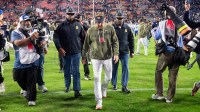 Auburn Tigers head coach Hugh Freeze walks off the field after Auburn Tigers take on Kentucky Wildcats.