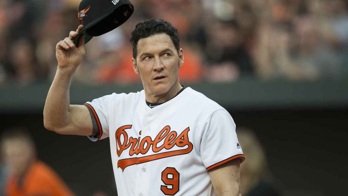 Baltimore Orioles former player Brady Anderson takes the field during the 1992 Orioles pregame ceremony prior to the game against the Los Angeles Angels at Oriole Park at Camden Yards.