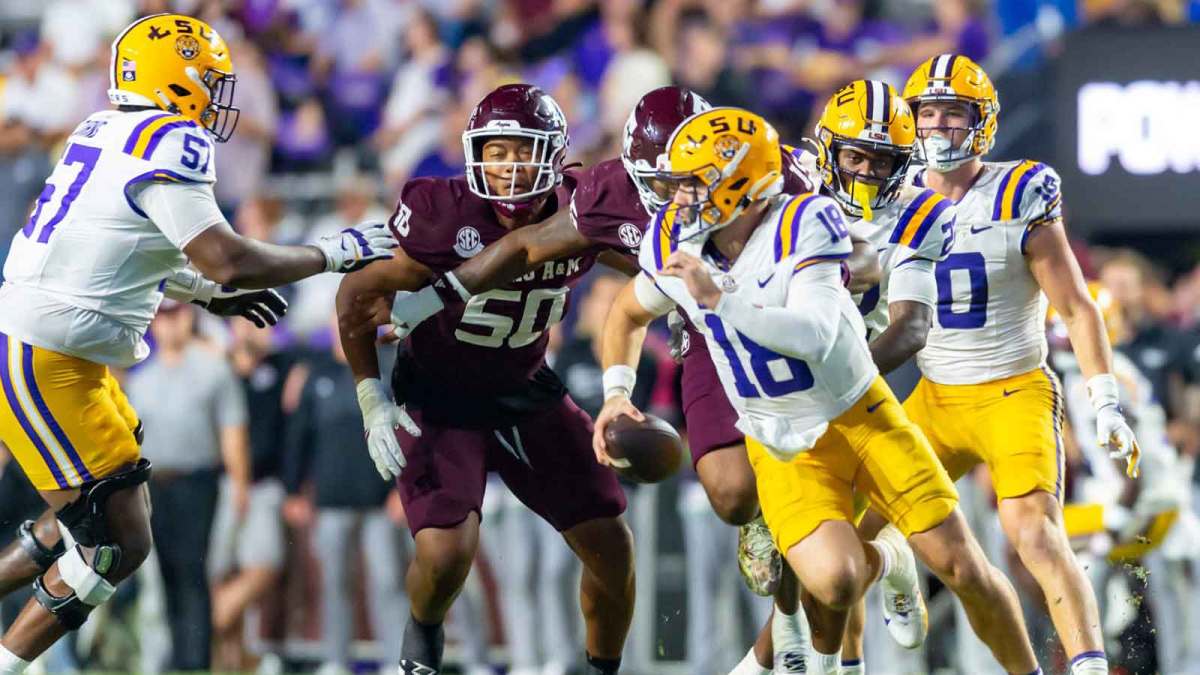 Tigers Quarterback Garrett Nussmeier 18 scrambles and is sacked by Linebacker Jaiden Bracker 15 as LSU Tigers take on the Texas A&M Aggies. October 25, 2025; Baton Rouge, Louisiana, USA; at Tiger Stadium. Saturday, Oct. 25, 2025.