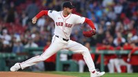 Boston Red Sox starting pitcher Garrett Whitlock (22) throws a pitch during the second inning against the Cleveland Guardians at Fenway Park.