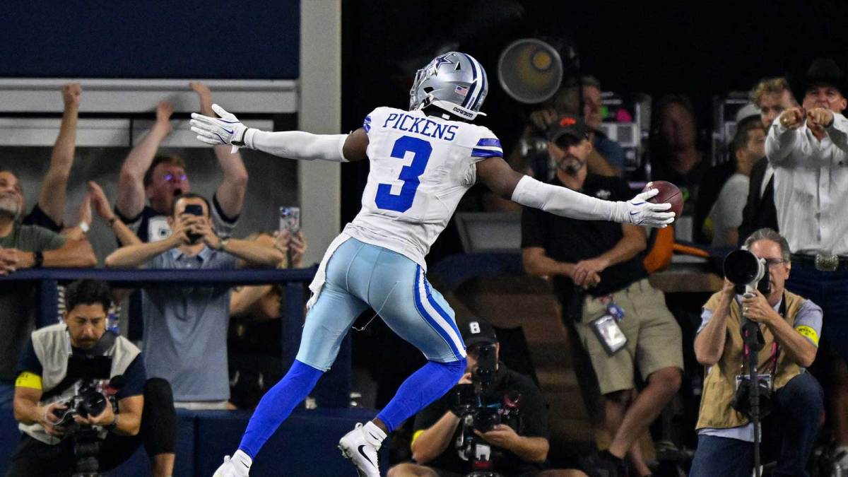 Dallas Cowboys wide receiver George Pickens (3) celebrates in the end zone after he catches a pass for a touchdown during the game between the Dallas Cowboys and the Green Bay Packers at AT&T Stadium. M