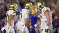 Georgia Tech Yellow Jackets quarterback Haynes King (10) celebrates with offensive lineman Keylan Rutledge (77) after a touchdown pass against the Pittsburgh Panthers in the second quarter at Bobby Dodd Stadium at Hyundai Field.