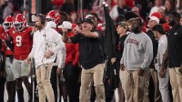 Georgia Bulldogs head coach Kirby Smart gestures in the second half against the Texas Longhorns at Sanford Stadium.