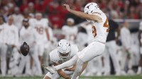 Texas Longhorns kicker Mason Shipley (49) kicks a field goal in the first half against the Georgia Bulldogs at Sanford Stadium. Mandatory Credit: Brett Davis-Imagn Images