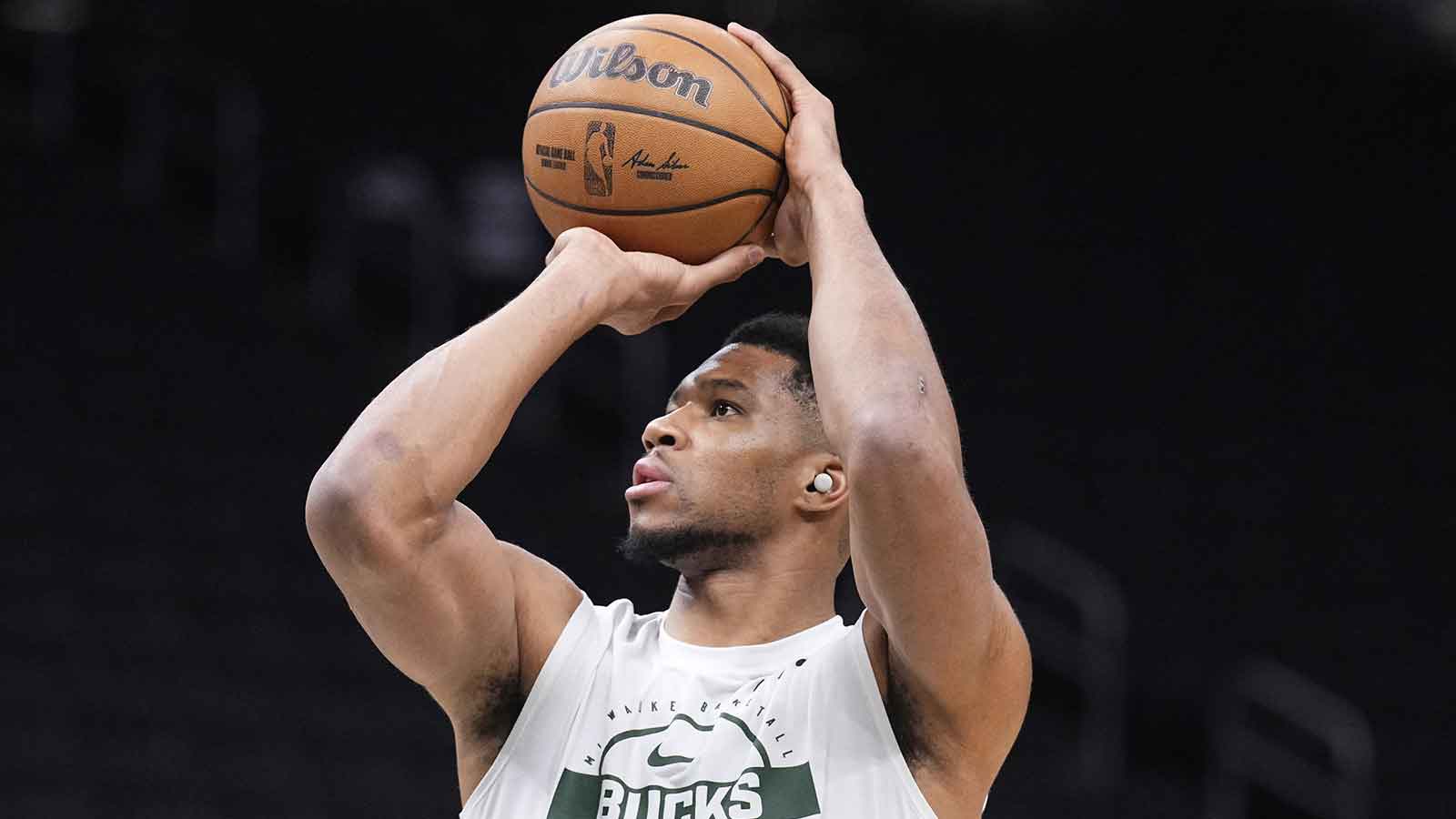  Milwaukee Bucks forward Giannis Antetokounmpo (34) puts up a shot during pregame warmups before a game against Houston Rockets at Fiserv Forum. 