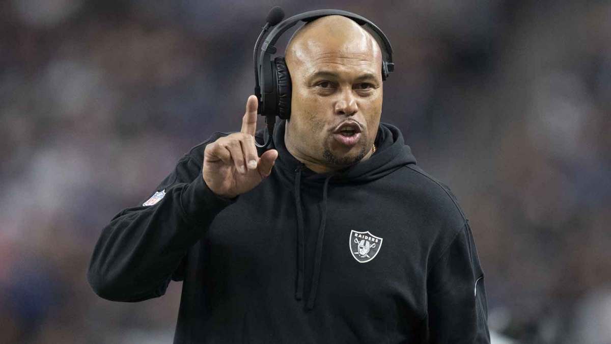 Las Vegas Raiders interim head coach Antonio Pierce signals against the New York Giants during the second quarter at Allegiant Stadium.
