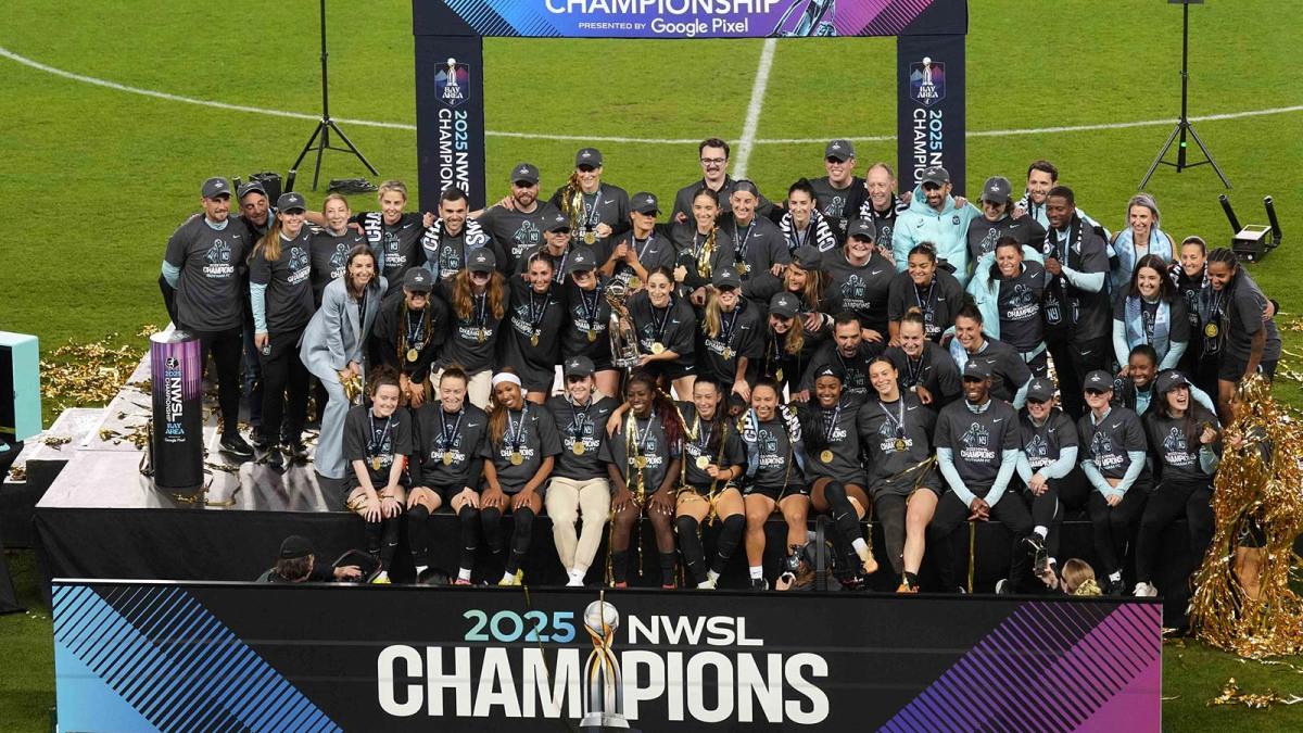 Gotham FC players and coaches celebrate on the podium after defeating the Washington Spirit in the 2025 NWSL Championship at PayPal Park.