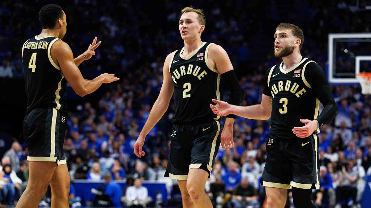 Purdue Boilermakers guard Fletcher Loyer (2), guard Braden Smith (3) and forward Trey Kaufman-Renn (4) huddle up during the first half against the Kentucky Wildcats at Rupp Arena at Central Bank Center.
