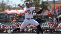 Baltimore Orioles starting pitcher Grayson Rodriguez (30) throws a pitch during the first inning against the Toronto Blue Jays at Ed Smith Stadium.