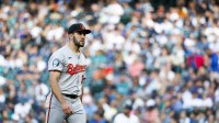 Baltimore Orioles starting pitcher Grayson Rodriguez (30), now with the Angeles, walks to the dugout following the second inning against the Seattle Mariners at T-Mobile Park.