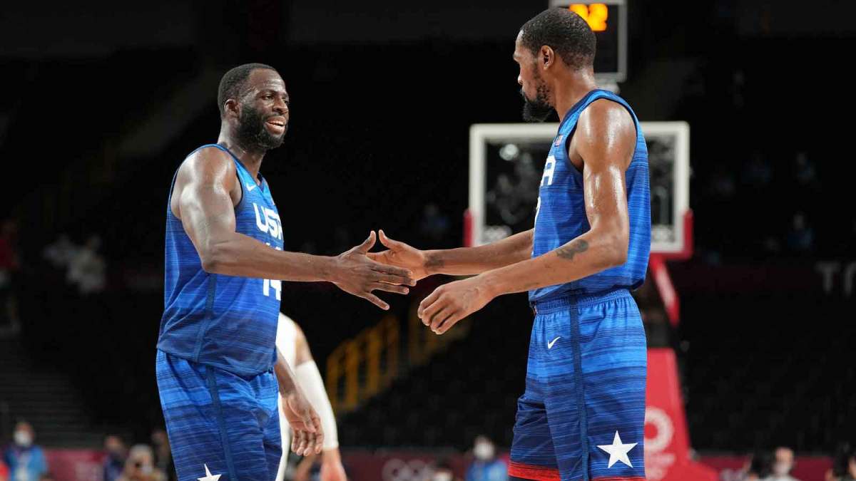 USA player Draymond Green (14), left, and USA player Kevin Durant (7) congratulate each other as USA beat Spain during the Tokyo 2020 Olympic Summer Games at Saitama Super Arena