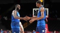 USA player Draymond Green (14), left, and USA player Kevin Durant (7) congratulate each other as USA beat Spain during the Tokyo 2020 Olympic Summer Games at Saitama Super Arena
