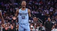 Grizzlies guard Ja Morant (12) reacts after getting called for foul