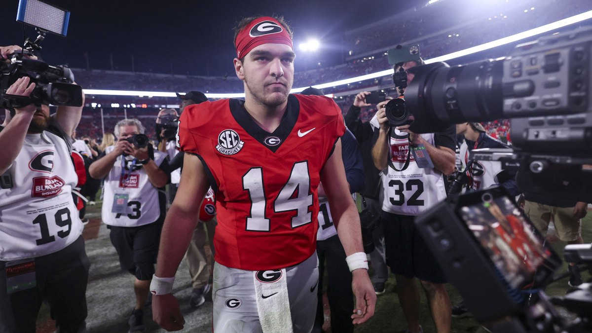 Georgia Bulldogs quarterback Gunner Stockton (14) looks on after the game against the Texas Longhorns at Sanford Stadium.