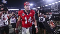 Georgia Bulldogs quarterback Gunner Stockton (14) looks on after the game against the Texas Longhorns at Sanford Stadium.