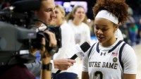 Notre Dame junior Hannah Hidalgo gets interviewed by ACC Network+ sideline reporter Tyler Reidy after scoring 44 points and recording 16 steals during an NCAA women's college basketball game between Notre Dame and Akron Wednesday, Nov. 12, 2025, at Purcell Pavilion in South Bend, Indiana.