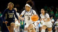 Notre Dame junior Hannah Hidalgo dribbles with the ball after recording her 15th of 16 steals during an NCAA women's college basketball game between Notre Dame and Akron Wednesday, Nov. 12, 2025, at Purcell Pavilion in South Bend, Indiana.