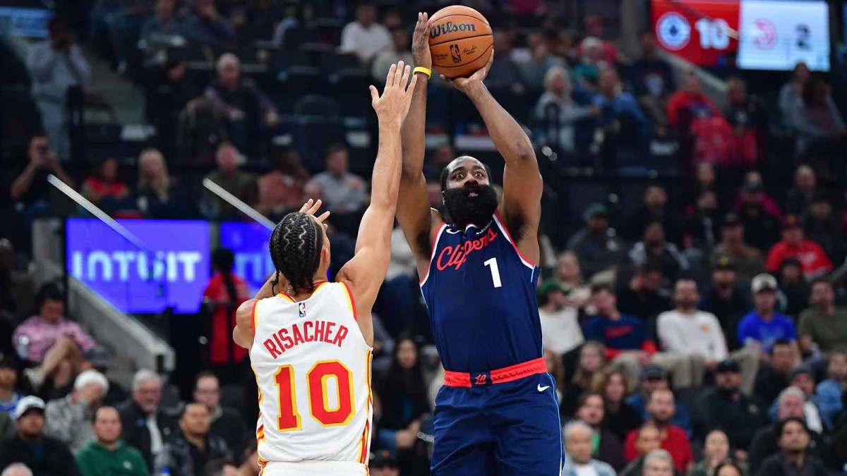 Los Angeles Clippers guard James Harden (1) shoots against Atlanta Hawks forward Zaccharie Risacher (10) during the first half at Intuit Dome.