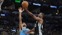 San Antonio Spurs forward Harrison Barnes (40) shoots over Memphis Grizzlies forward Santi Aldama (7) in the first half at Frost Bank Center.