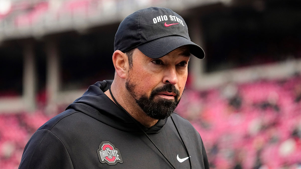 Ohio State Buckeyes head coach Ryan Day leads warm ups prior to the NCAA football game against the Penn State Nittany Lions at Ohio Stadium in Columbus on Nov. 1, 2025.