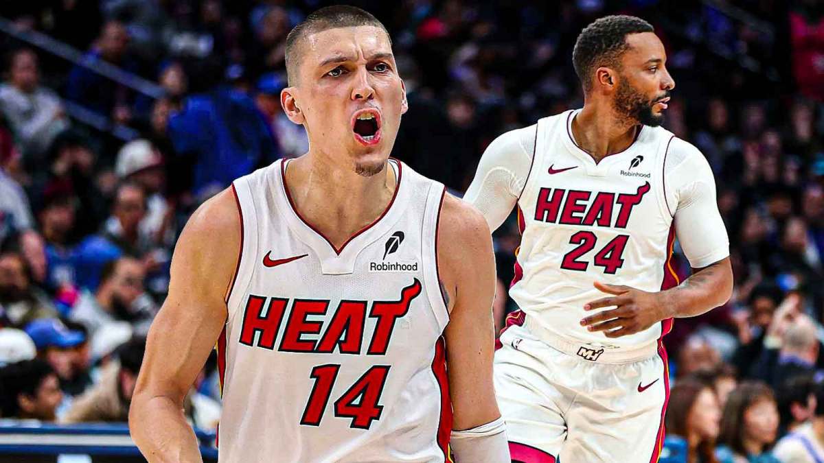 Miami Heat stars Tyler Herro and Norman Powell in front of Kaseya Center.