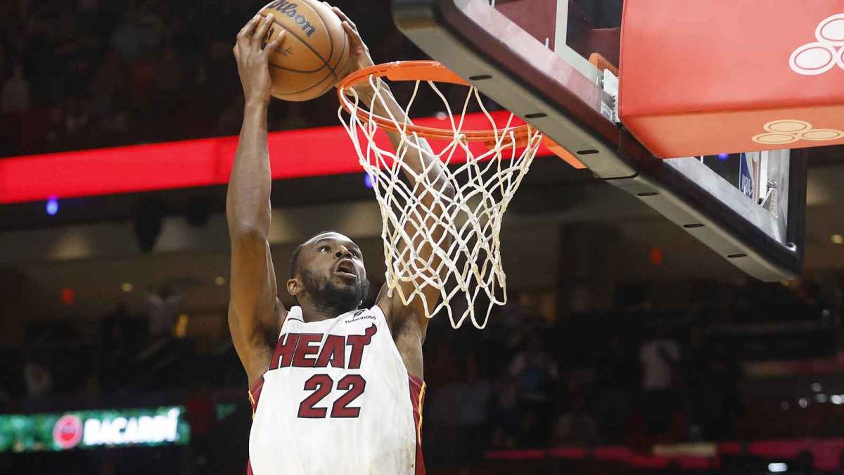 Miami Heat forward Andrew Wiggins (22) dunks against the Cleveland Cavaliers during overtime at Kaseya Center.
