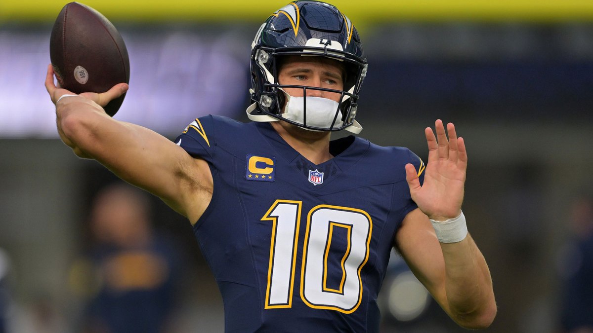 Los Angeles Chargers quarterback Justin Herbert (10) practices before the game at SoFi Stadium.