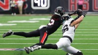 Houston Texans safety Calen Bullock (2) breaks up a pass to Jacksonville Jaguars tight end Johnny Mundt (86) during the first half at NRG Stadium.