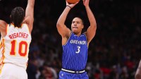 Orlando Magic guard Desmond Bane (3) shoots against the Atlanta Hawks in the second quarter at State Farm Arena.