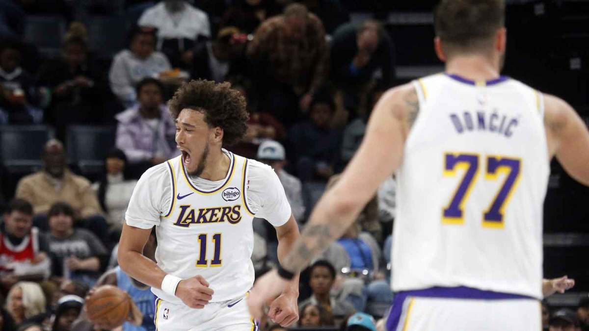 Los Angeles Lakers center Jaxson Hayes (11) reacts after an alley-op dunk assisted by guard Luka Doncic (77) during the third quarter against the Memphis Grizzlies at FedExForum.