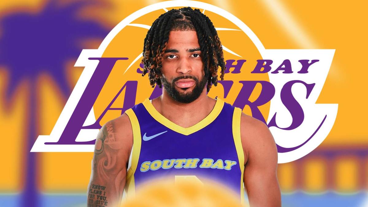 NBA player RJ Davis in a South Bay Lakers jersey with the South Bay Lakers logo in the background