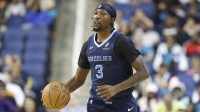 Memphis Grizzlies guard Kentavious Caldwell-Pope (3) brings the ball up the court during the second half against the Charlotte Hornets at First Horizon Coliseum.