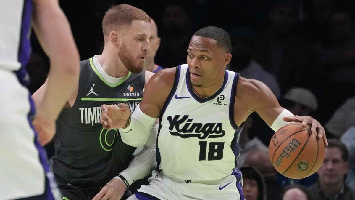 Sacramento Kings guard Russell Westbrook (18) works around Minnesota Timberwolves guard Donte DiVincenzo (0) in the first quarter at Target Center.