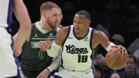 Sacramento Kings guard Russell Westbrook (18) works around Minnesota Timberwolves guard Donte DiVincenzo (0) in the first quarter at Target Center.