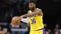 Los Angeles Lakers guard Marcus Smart (36) directs the offense during the second quarter against the Charlotte Hornets at Spectrum Center.