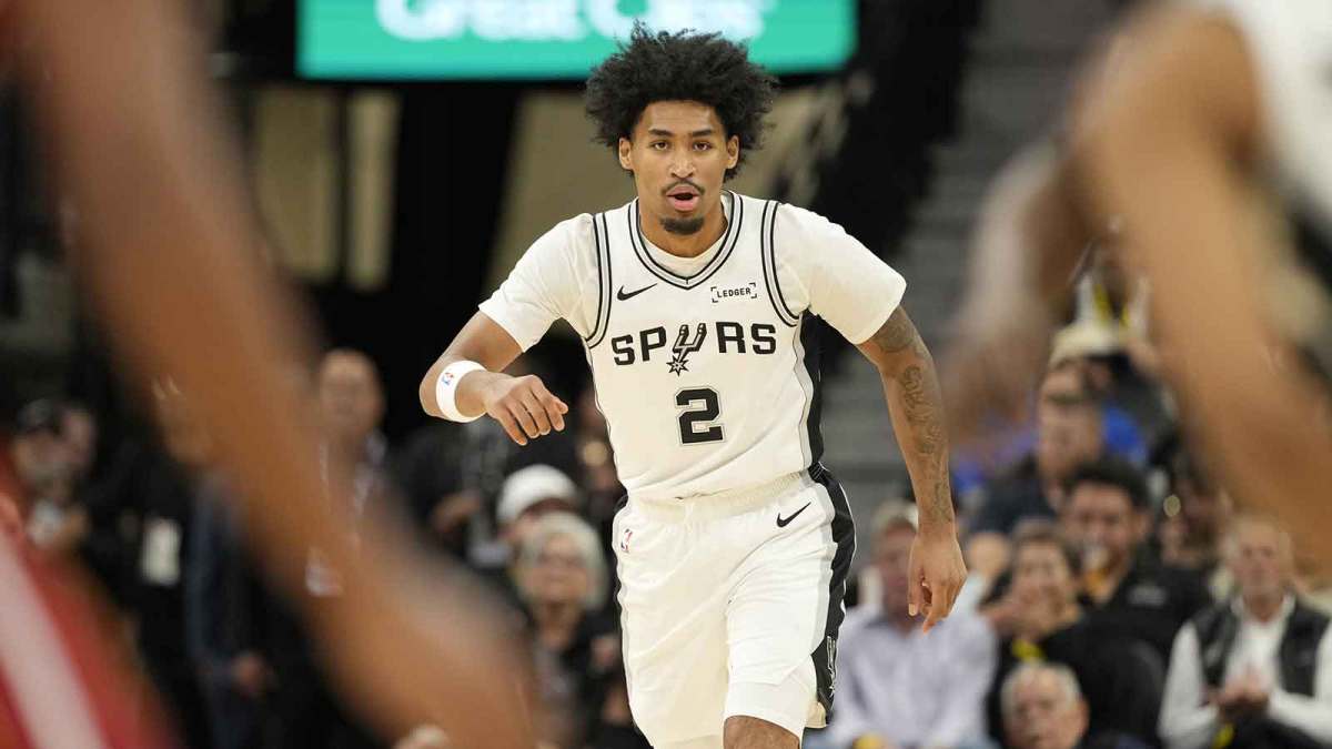 San Antonio Spurs guard Dylan Harper (2) gets back on defense during the first half against the Miami Heat at Frost Bank Center.