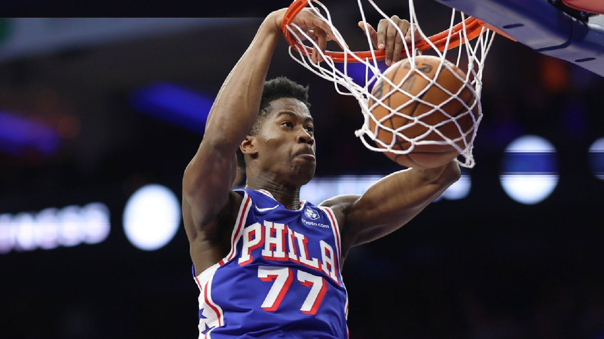 Philadelphia 76ers guard VJ Edgecombe (77) dunks the ball against the Toronto Raptors during the second quarter at Xfinity Mobile Arena.