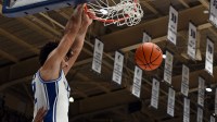 Duke Blue Devils forward Cameron Boozer (12) dunks during the second half against the Howard Bison at Cameron Indoor Stadium.