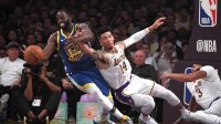 Golden State Warriors forward Draymond Green (23) and Los Angeles Lakers guard Danny Green (14) battle for the ball in the first half at Staples Center.