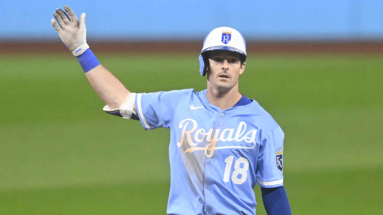 Kansas City Royals left fielder Mike Yastrzemski (18) celebrates his double in the third inning against the Cleveland Guardians at Progressive Field.