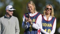 Nov 12, 2025; Belleair, Florida, USA; Indiana Fever guard Sophie Cunningham (8) looks on during the Annika Pro-Am golf tournament at Pelican Golf Club. Mandatory Credit: Nathan Ray Seebeck-Imagn Images