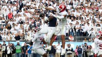 Penn State Nittany Lions wide receiver Kyron Hudson (1) attempts to catch a “Hail Mary” pass during the fourth quarter against the Indiana Hoosiers at Beaver Stadium.