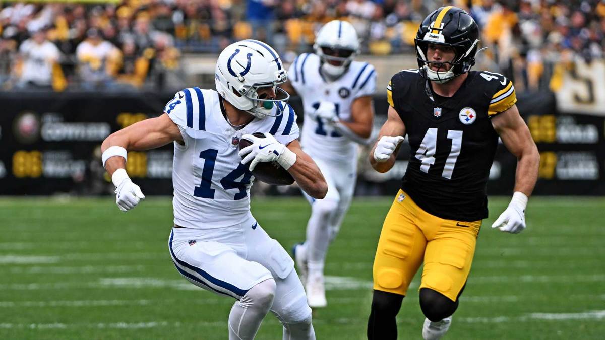 Indianapolis Colts wide receiver Alec Pierce (14) catches a pass during the first half as Pittsburgh Steelers linebacker Payton Wilson (41) defends at Acrisure Stadium.