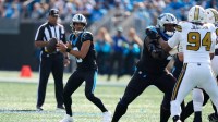 Carolina Panthers quarterback Bryce Young (9) drops back to pass during the first quarter against the New Orleans Saints at Bank of America Stadium.
