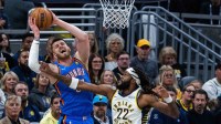 Oklahoma City Thunder center Isaiah Hartenstein (55) shoots the ball while Indiana Pacers forward Isaiah Jackson (22) defends in the first half at Gainbridge Fieldhouse.