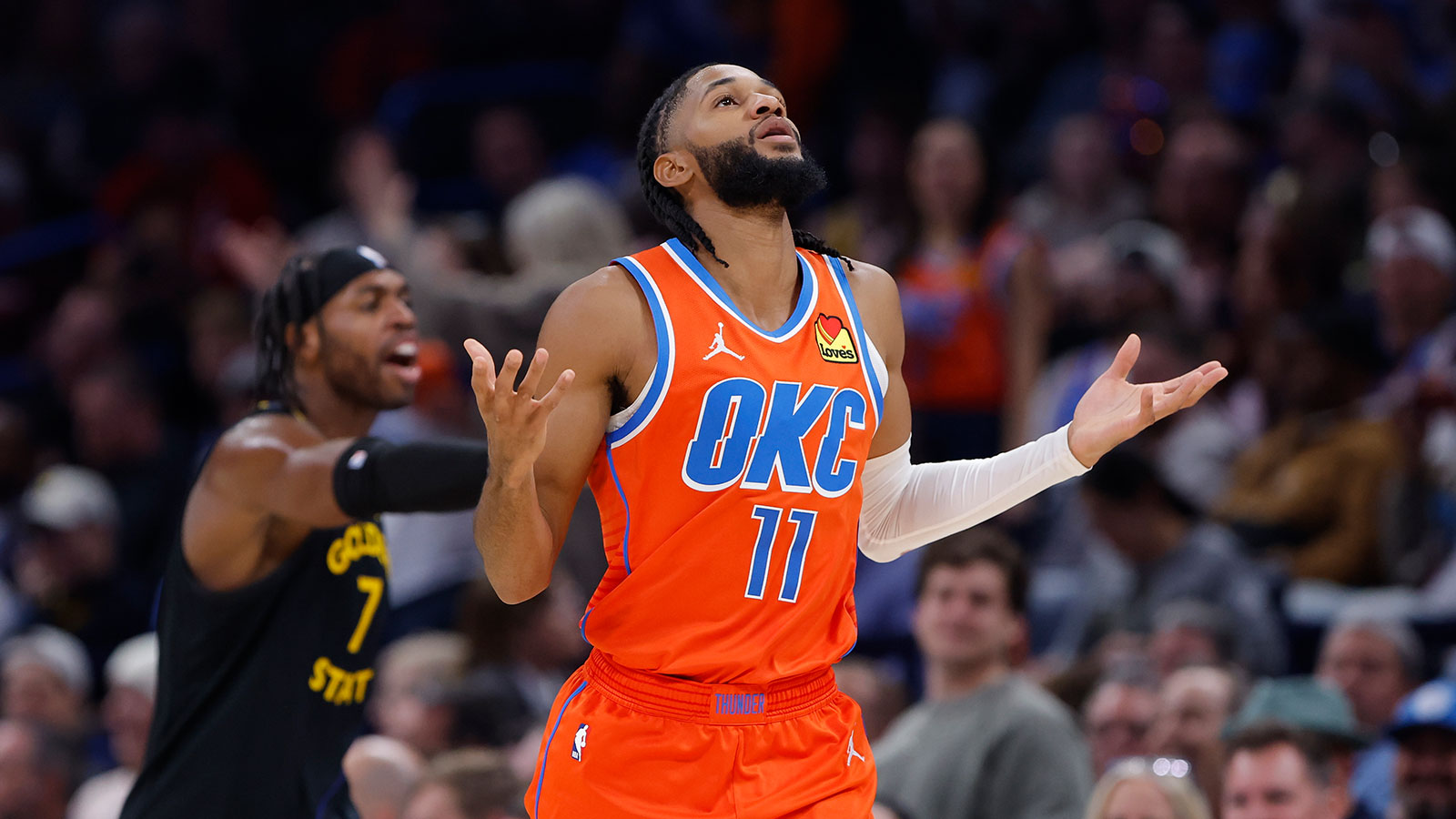 Oklahoma City Thunder guard Isaiah Joe (11) gestures after scoring against the Golden State Warriors during the second half at Paycom Center.