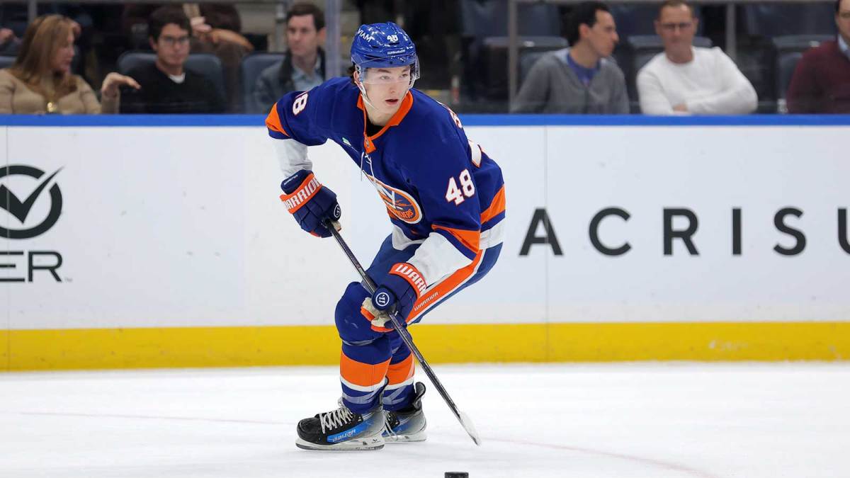 New York Islanders defenseman Matthew Schaefer (48) skates with the puck against the Boston Bruins during the first period at UBS Arena.
