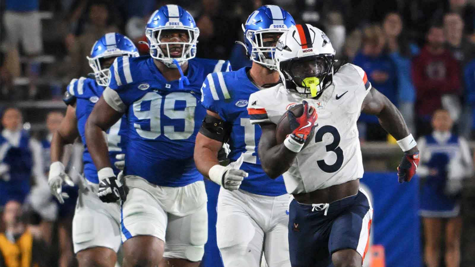 Virginia Cavaliers running back J'Mari Taylor (3) runs the ball past the Duke Blue Devils defense for a touchdown during the third quarter at Wallace Wade Stadium.