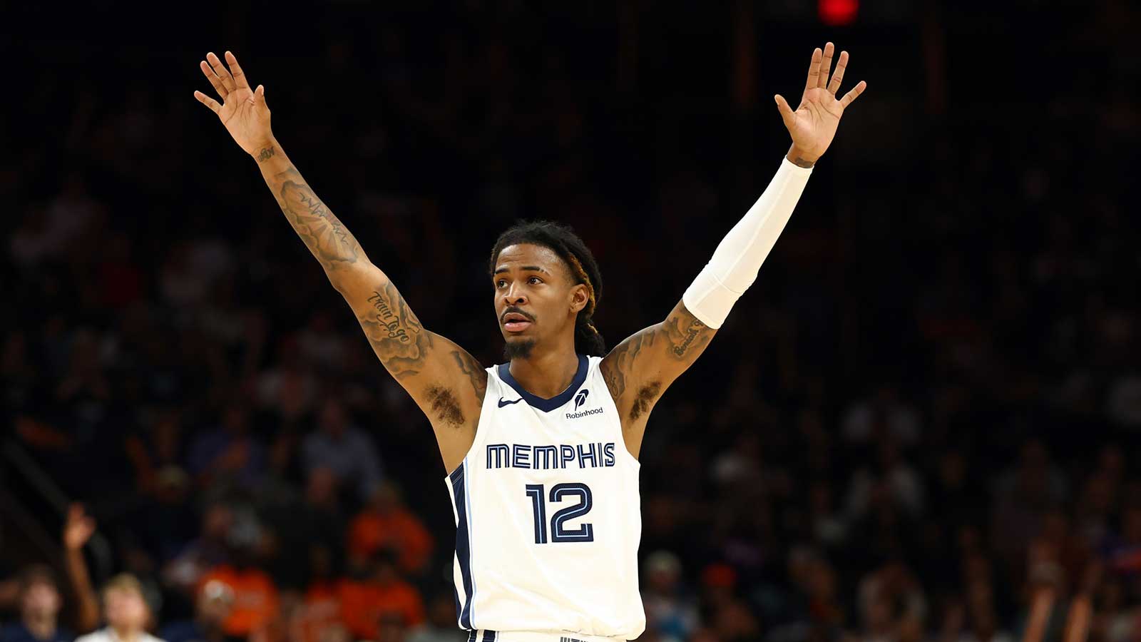 Memphis Grizzlies guard Ja Morant (12) reacts against the Phoenix Suns during the second half at the Mortgage Matchup Center.