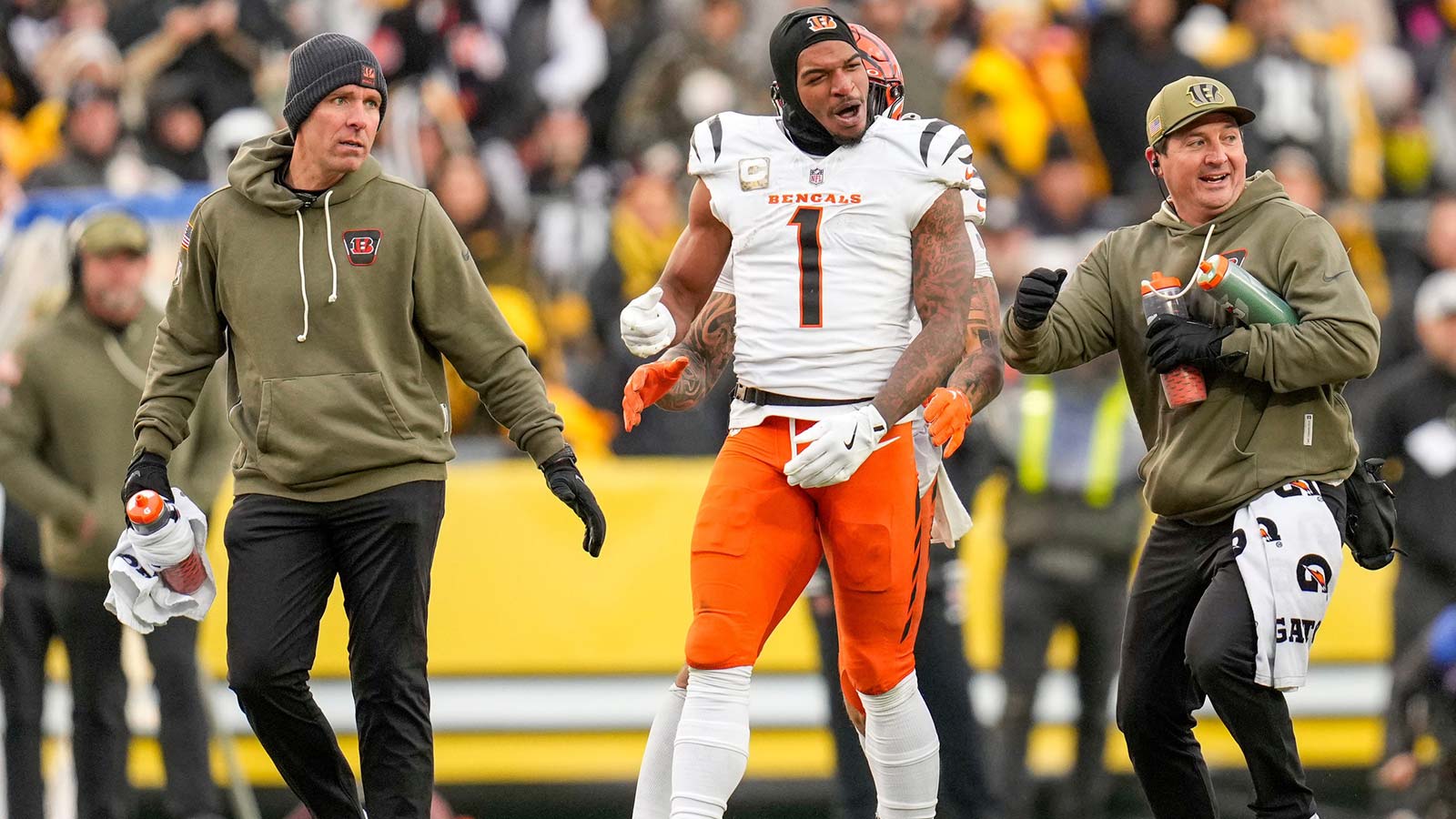 Cincinnati Bengals wide receiver Ja'Marr Chase (1) is pushed out of a skirmish at midfield in the fourth quarter of the NFL Week 11 game between the Pittsburgh Steelers and the Cincinnati Bengals at Acrisure Stadium in Pittsburgh on Sunday, Nov. 16, 2025. The Bengals lost 34-12.